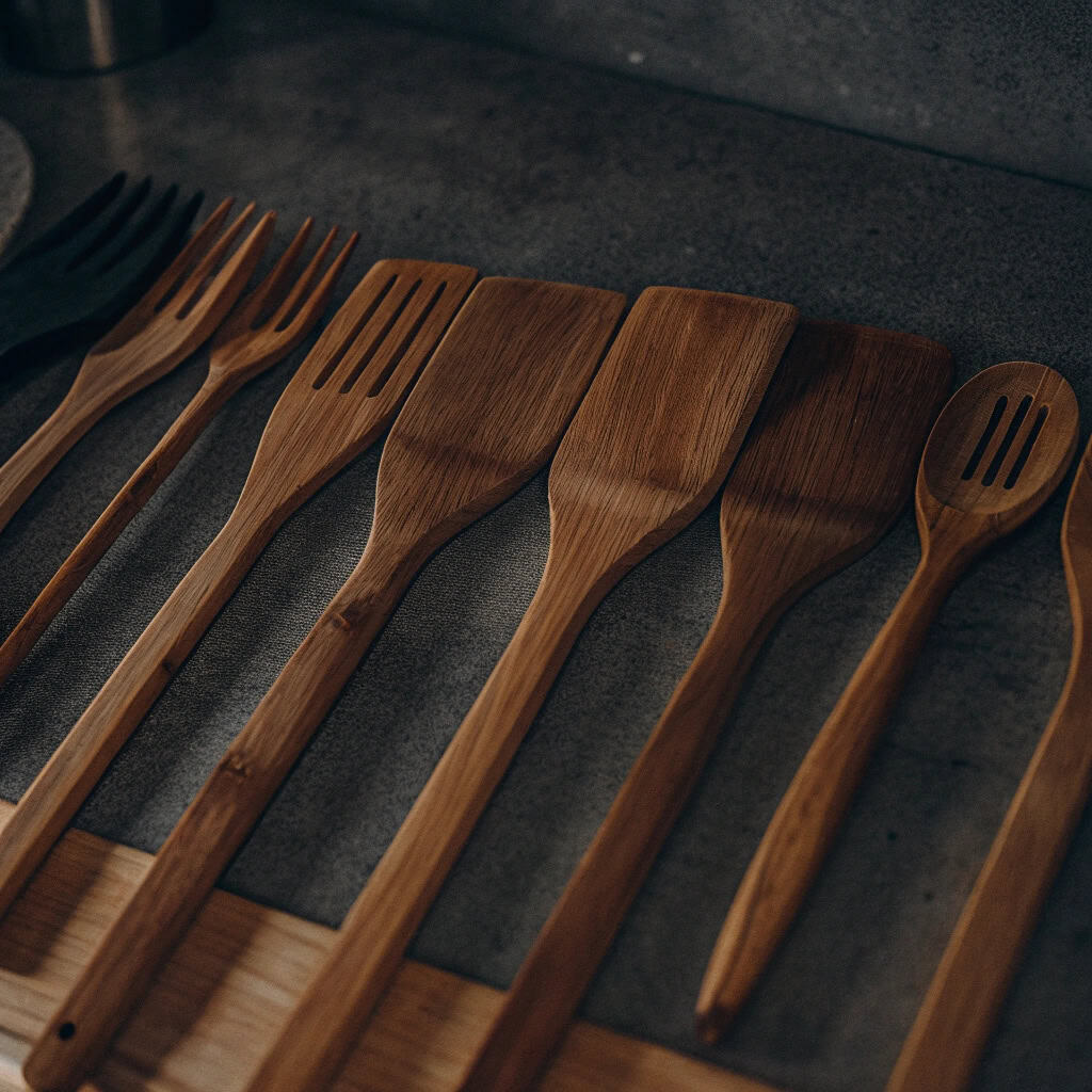 Wooden spatula safely stirring in a non-stick pan