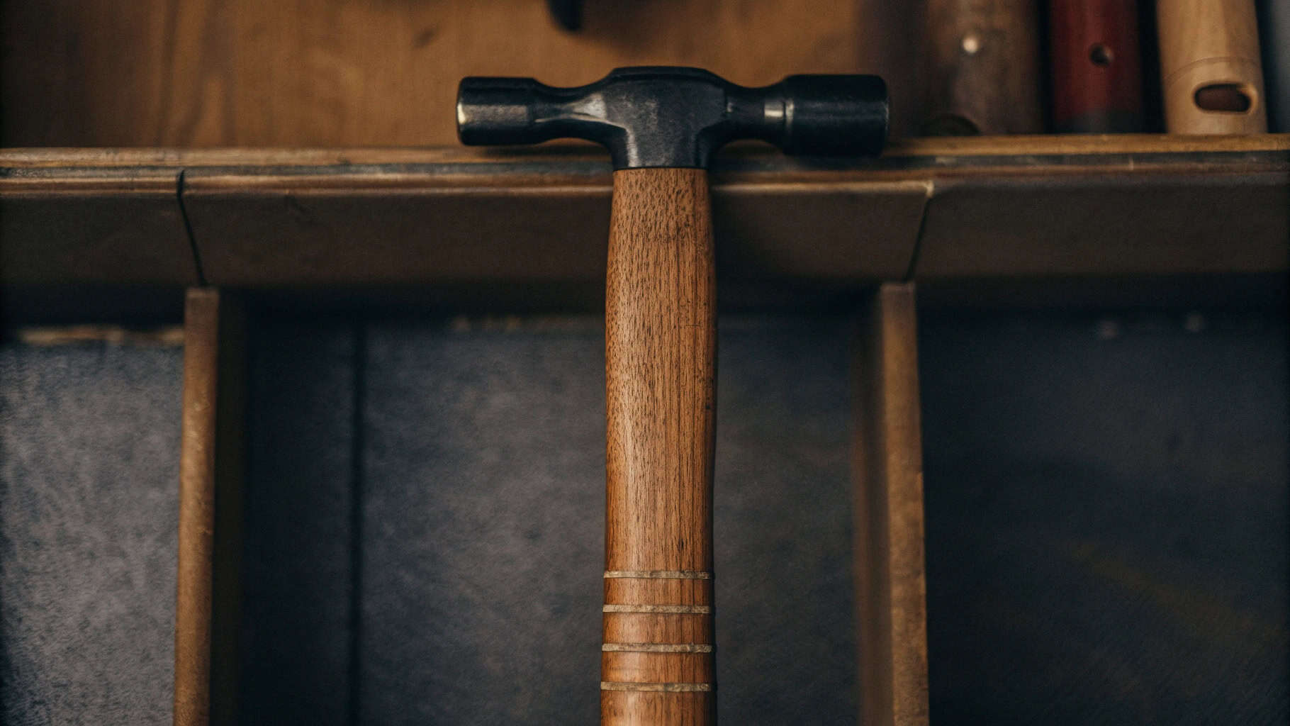Hand applying Boiled Linseed Oil (BLO) to a smooth Hickory hammer handle