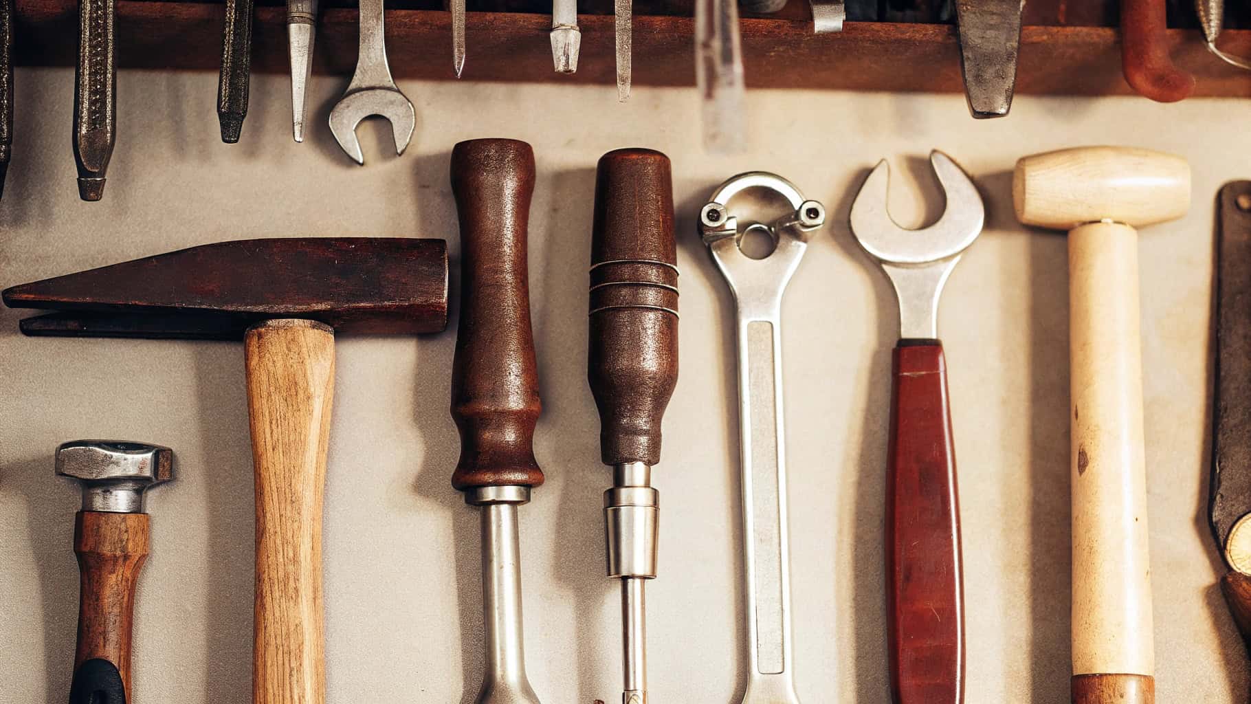 Assortment of handles showing different materials, shapes, and lengths