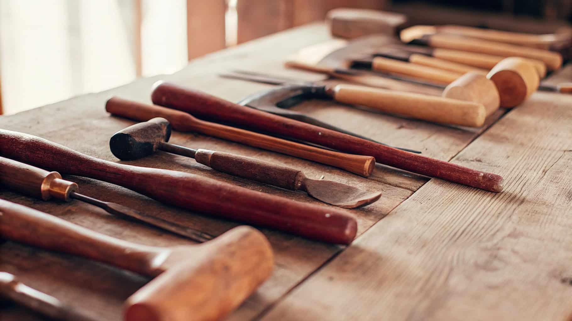 Old but well-maintained wooden tool handle showing longevity