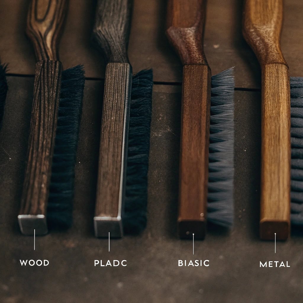 Collection of brush handles showing different materials: Beech, Pine, Plastic, Bamboo